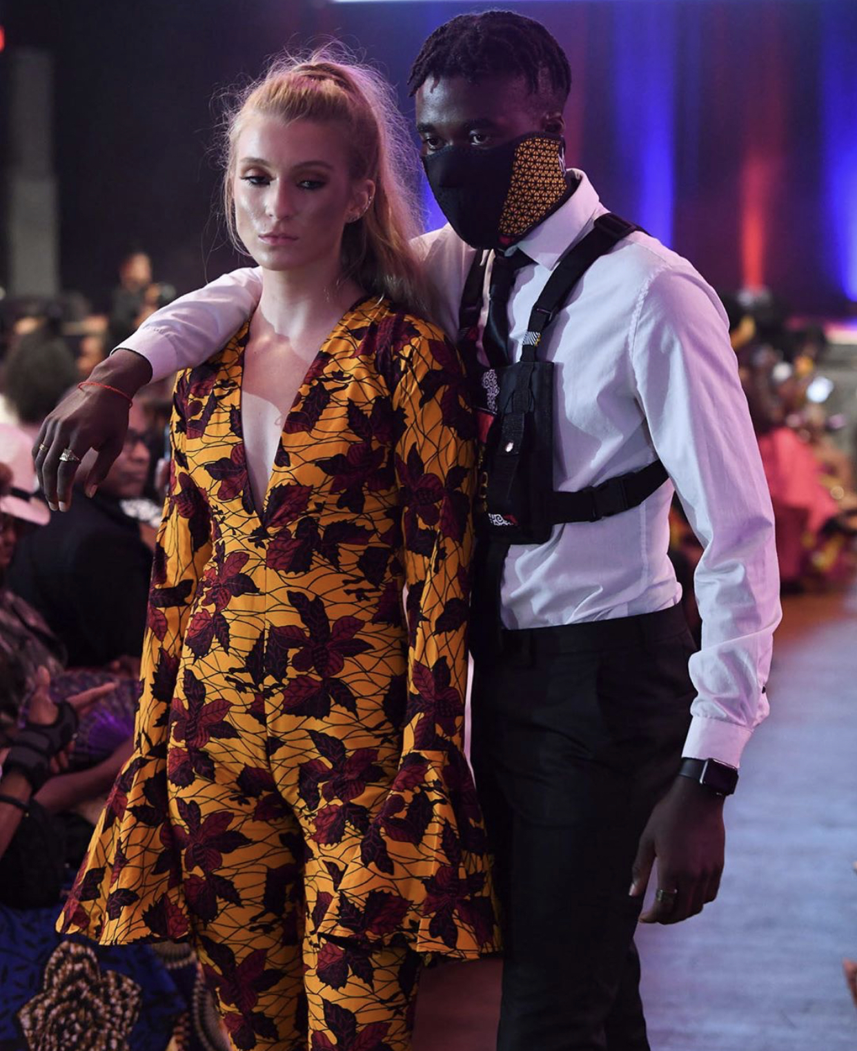 African fashion show, showcasing bold prints and beautiful designs. 