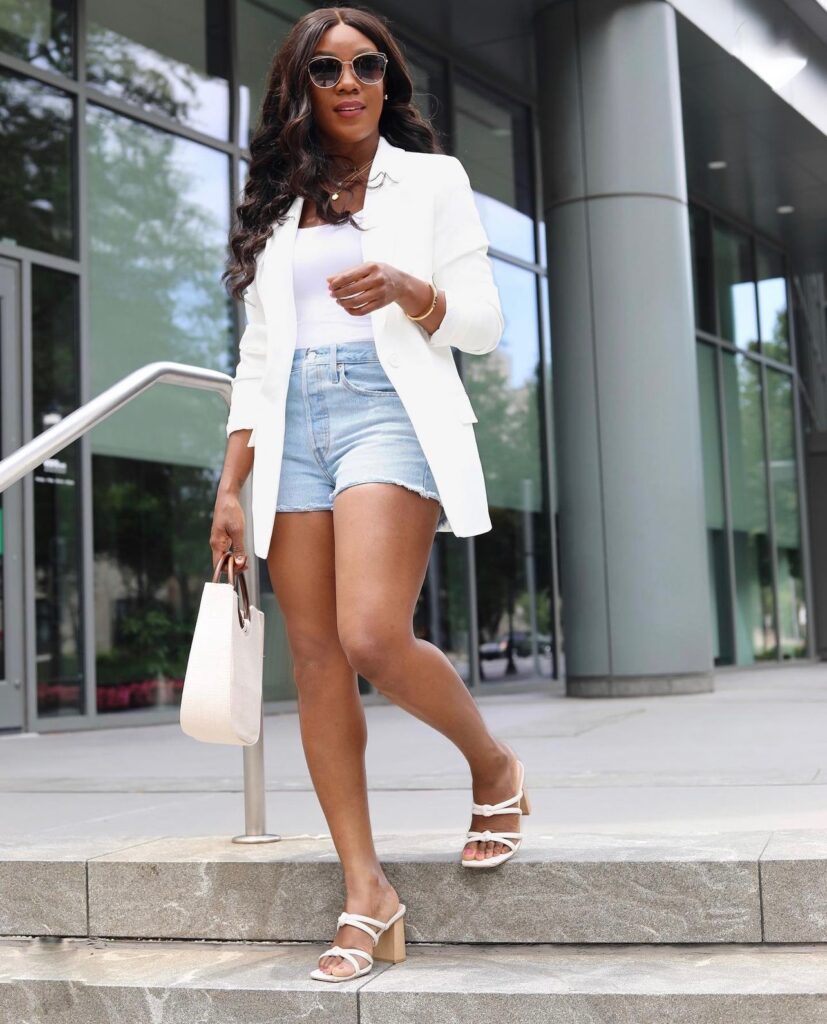 White blazer style with shorts and block heels.